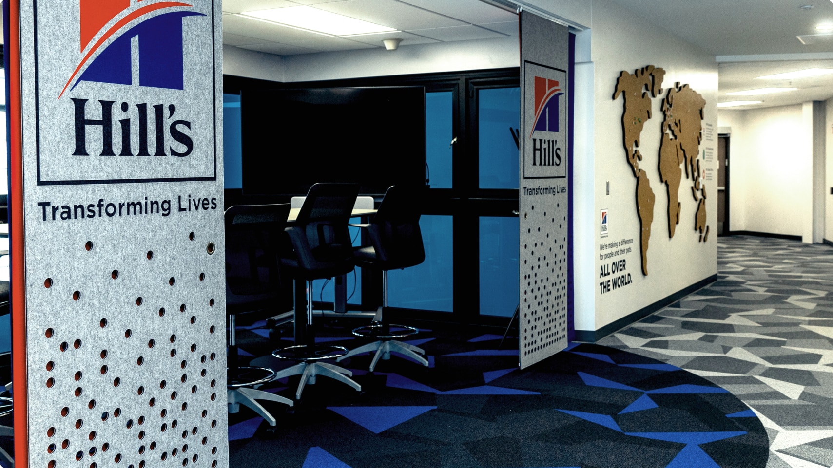 Hill's Pet Nutrition Centre office hallway with a world map on the wall